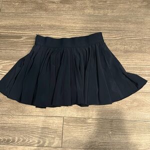 A navy blue skirt from aritzia in a size S